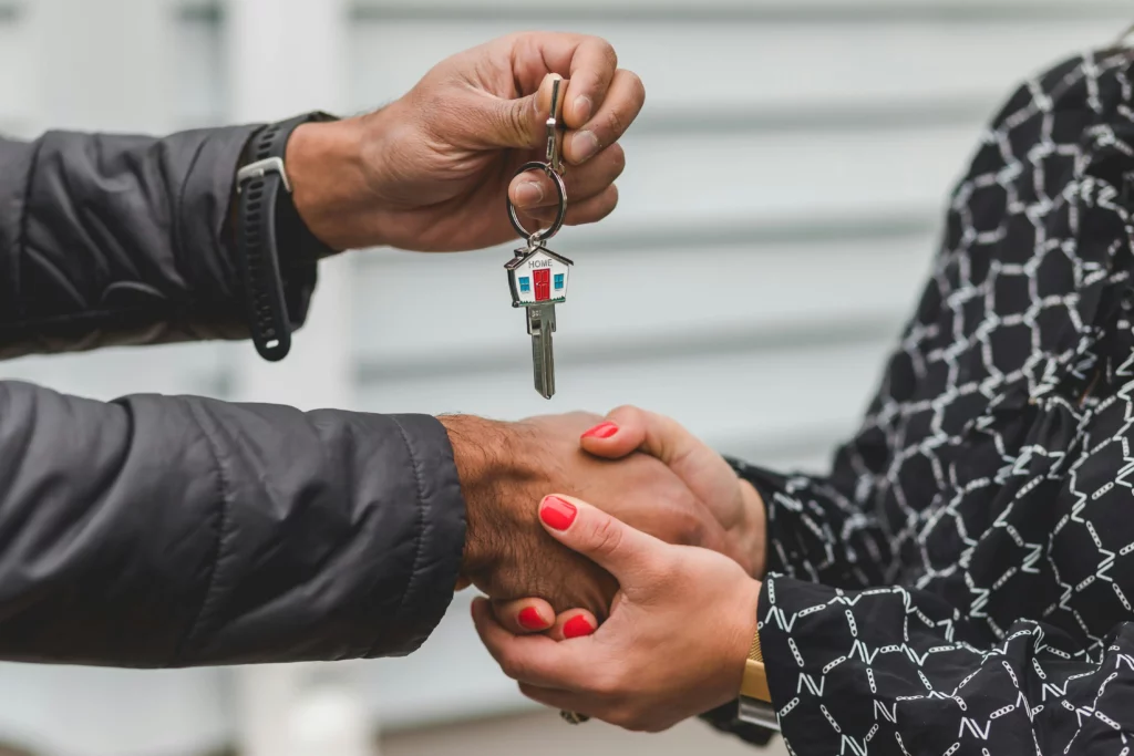 Photo by RDNE Stock project httpswww.pexels.comphotoperson-holding-silver-key-8293778